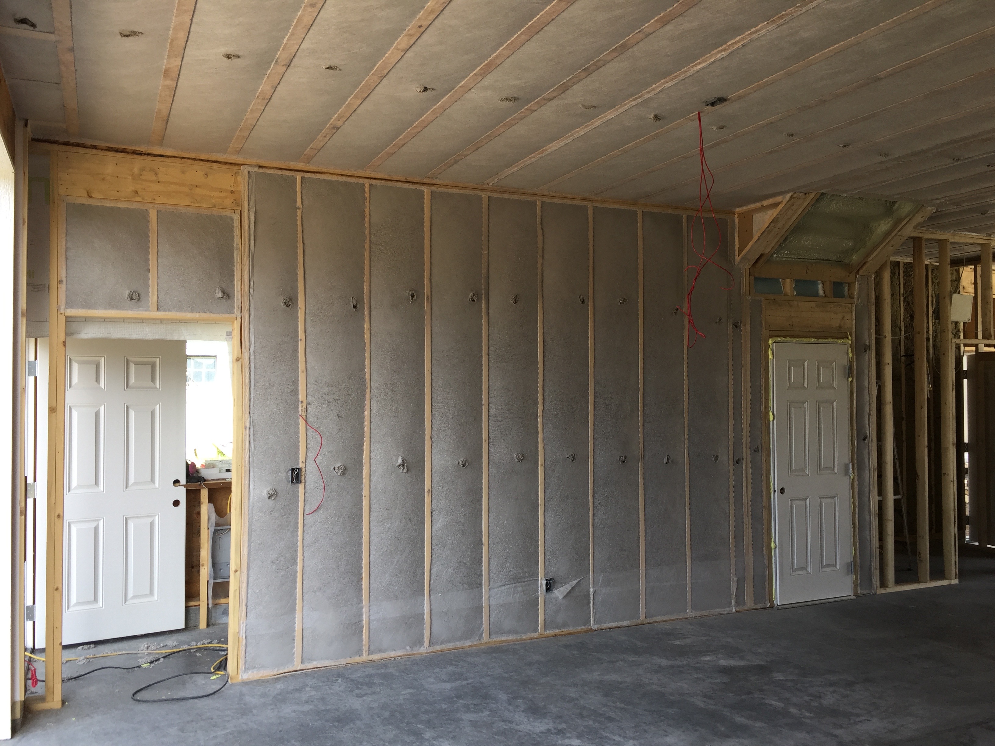 Dense pack cellulose Intello Smart Vapour over our Code-Plus Wall Assembly